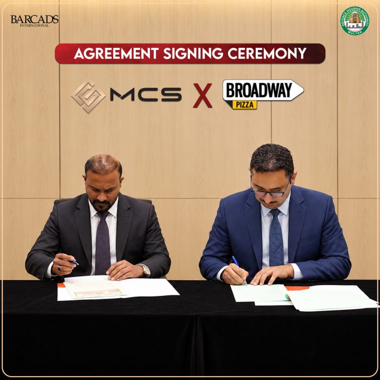 MCS x Broadway Pizza agreement-signing photograph